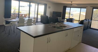 Relax and enjoy the beach air. 2 mins walk to the beach.