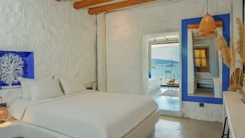 Deluxe King Suite | Biancheria da letto di alta qualità, copriletto in piuma