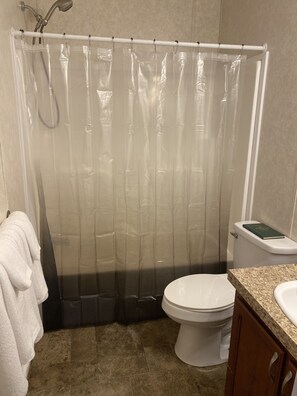 Combined shower/tub