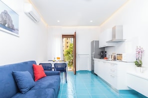 Comfort Apartment | Living area | 40-inch Smart TV with digital channels, TV