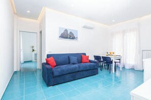 Departamento Confort | Área de sala de estar | Smart TV de 40 pulgadas con canales digitales y televisión 