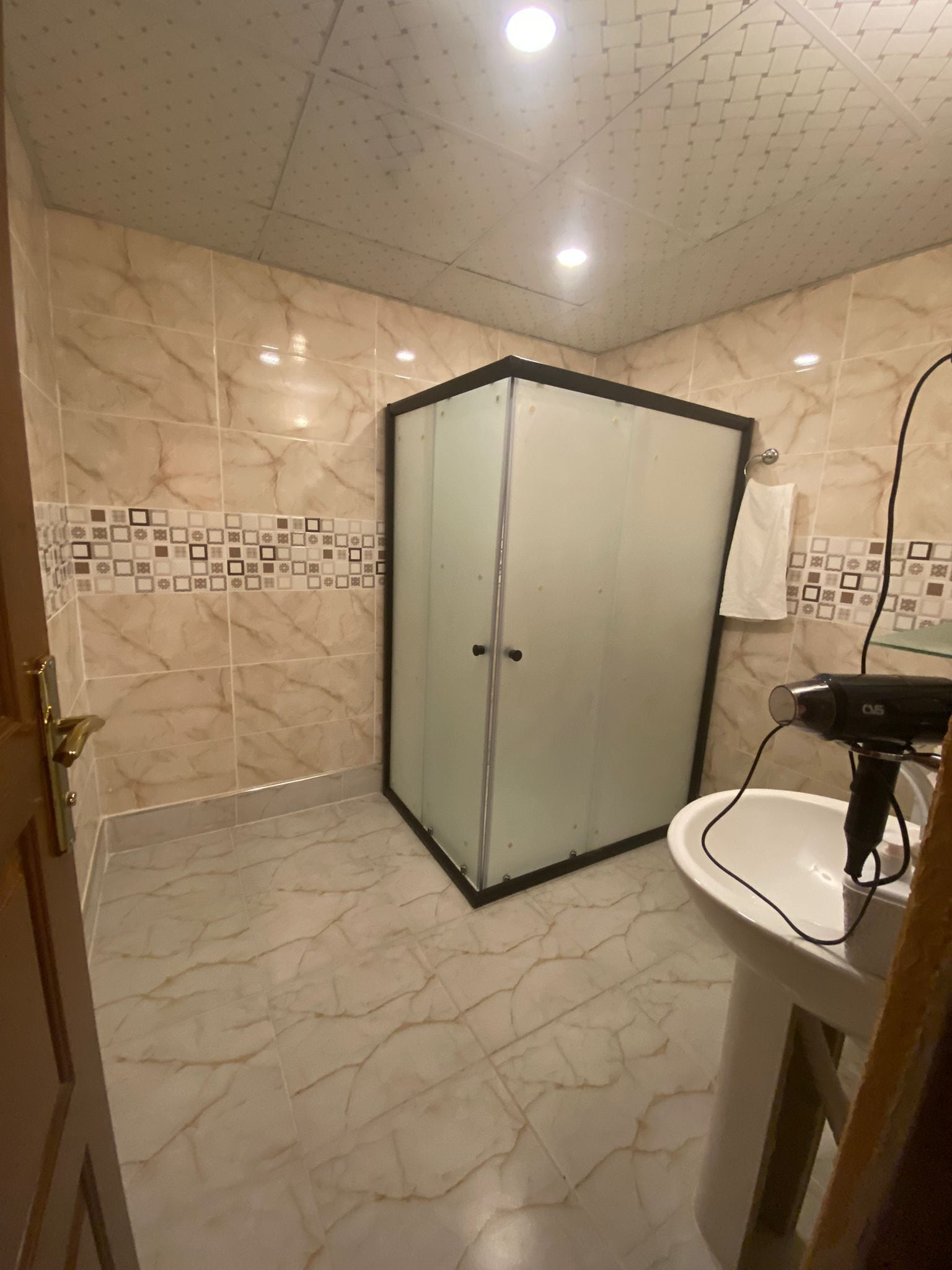 free toiletries, hair dryer, slippers, towels