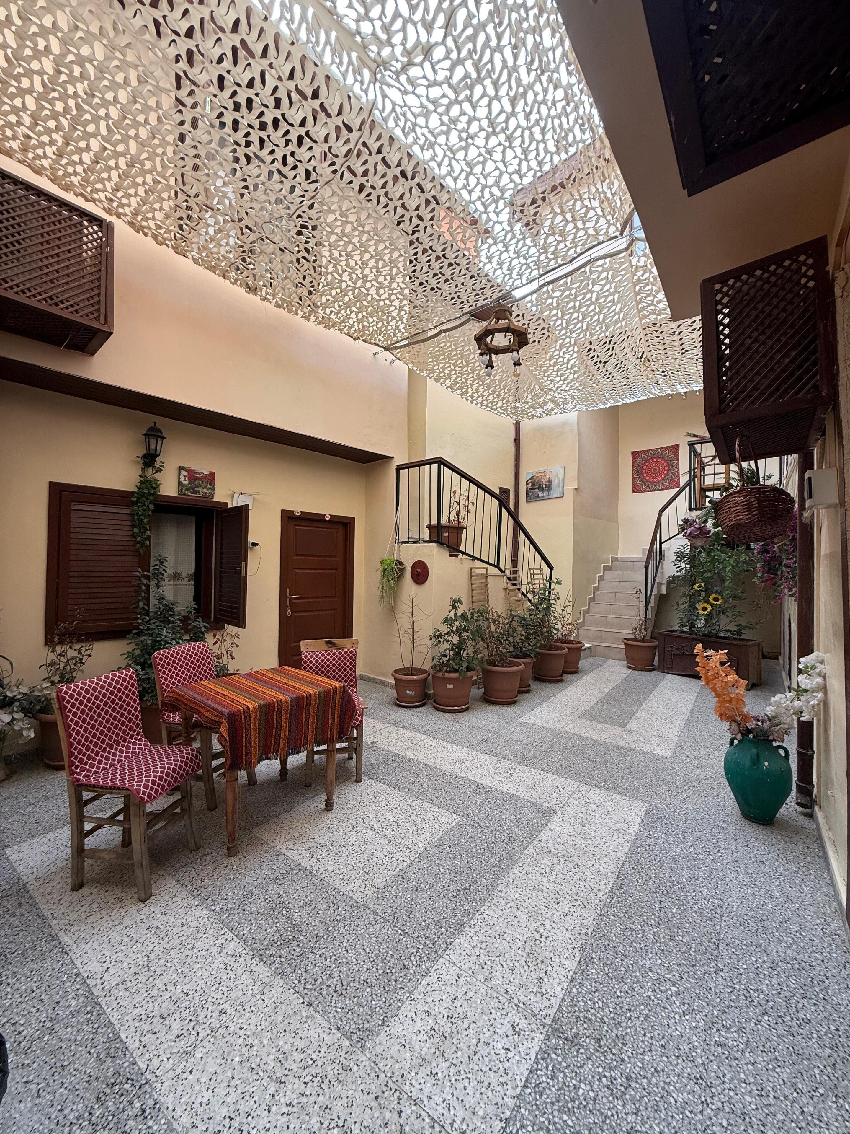 Economy Room | Living area | Flat-screen TV