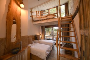 A bedroom with two beds, a wooden ladder, a hanging light fixture, and a view of the outdoors. - eco-lodge with natural swimming pool (PUECHABON)