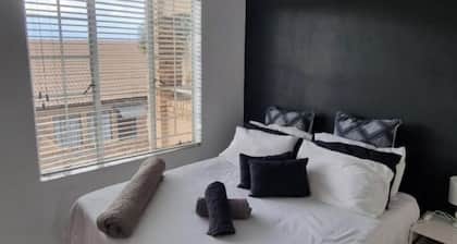 5 minutes to shops and malls