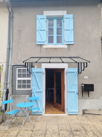 Outdoor dining. Charming little cottage in a fortified village