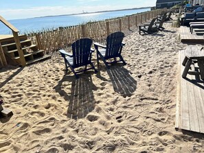On the beach, sun loungers