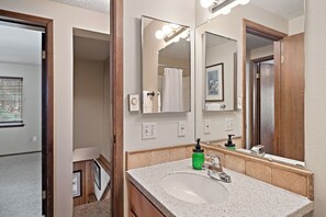Townhome | Bathroom | Combined shower/tub, hair dryer, towels, soap - Trapper 8 (West Yellowstone)