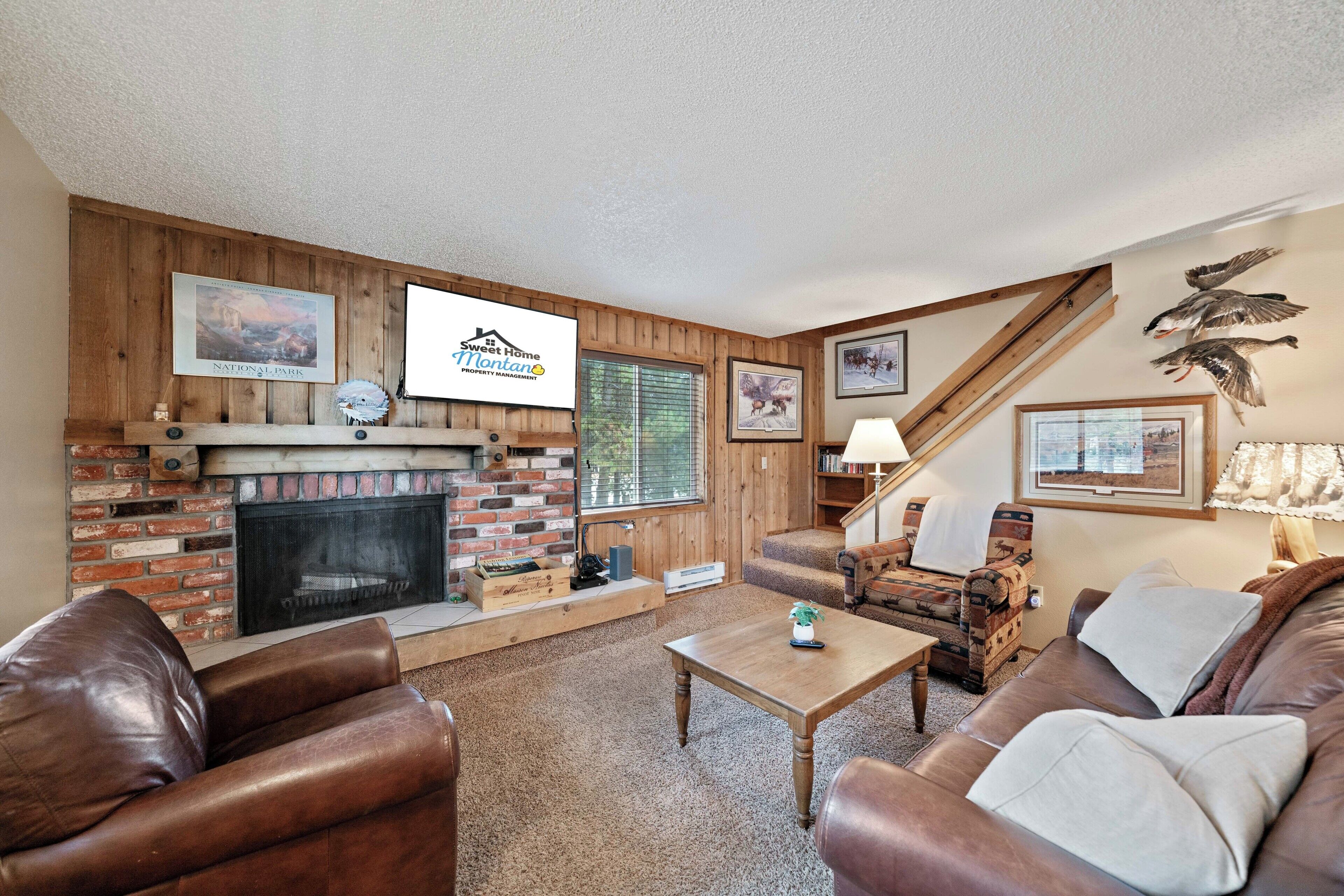 Townhome | Living area | 42-inch flat-screen TV with satellite channels, TV, fireplace