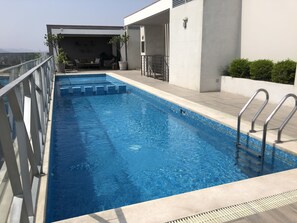 Outdoor pool - Moderno depa con piscina, gimnasio y cooworking (Surquillo)