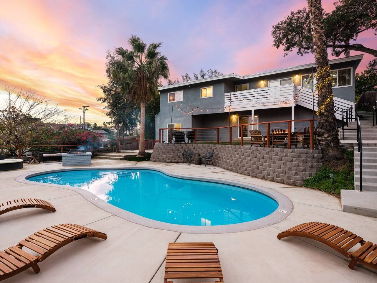 Heated pool, outdoor fire pits, chef's kitchen