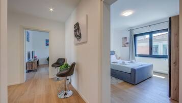 2 bedrooms, laptop workspace, iron/ironing board, bed sheets