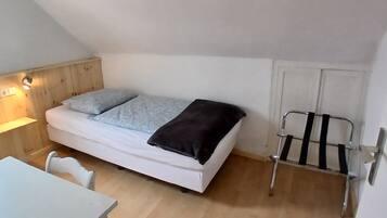 Eenvoudige eenpersoonskamer | Gratis wifi, beddengoed