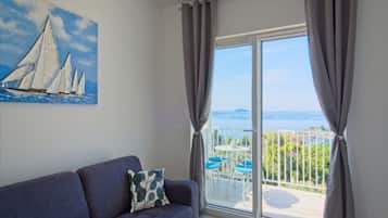 Apartamento (One Bedroom Apartment with Balcony an) | Sala de estar | TV