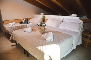 Habitación superior | Minibar, caja de seguridad en la habitación, wifi gratis y ropa de cama