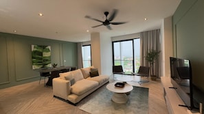 Deluxe Condo, 3 Bedrooms | Living area