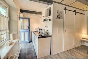 Fridge, microwave, stovetop, coffee/tea maker
