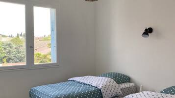 4 bedrooms, iron/ironing board, travel crib, bed sheets