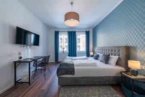 Deluxe Suite | Individually decorated, individually furnished, desk, iron/ironing board