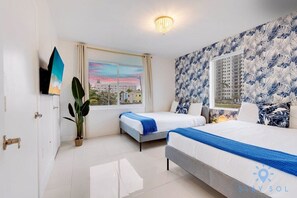 2 bedrooms, desk, iron/ironing board, travel crib