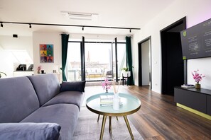 Junior Penthouse mit Balkon | Living area