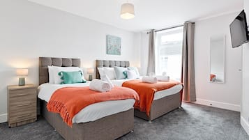 4 habitaciones, tabla de planchar con plancha y wifi gratis