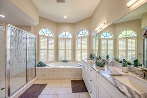 Bathtub, hair dryer, towels, soap