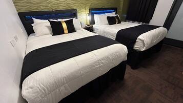 Deluxe Double Beds Room | Hypo-allergenic bedding, down comforters, in-room safe, desk