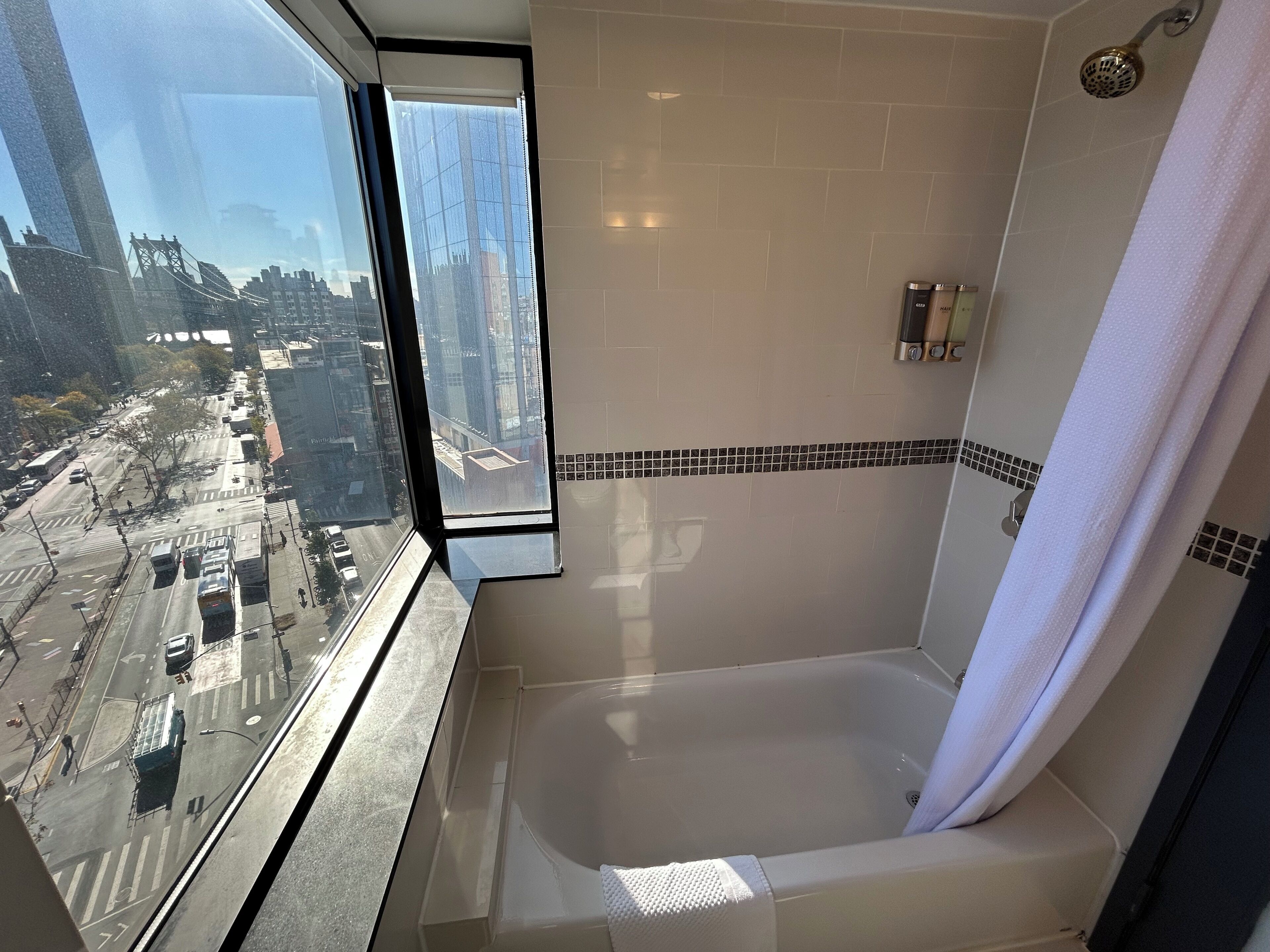 City View Queen Bed Room | Bathroom | Combined shower/tub, rainfall showerhead, free toiletries, hair dryer