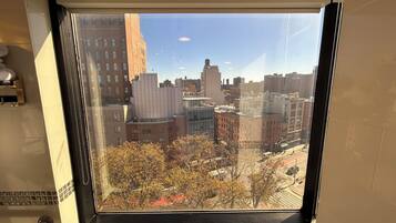 City View Queen Bed Room | Bathroom | Combined shower/tub, rainfall showerhead, free toiletries, hair dryer