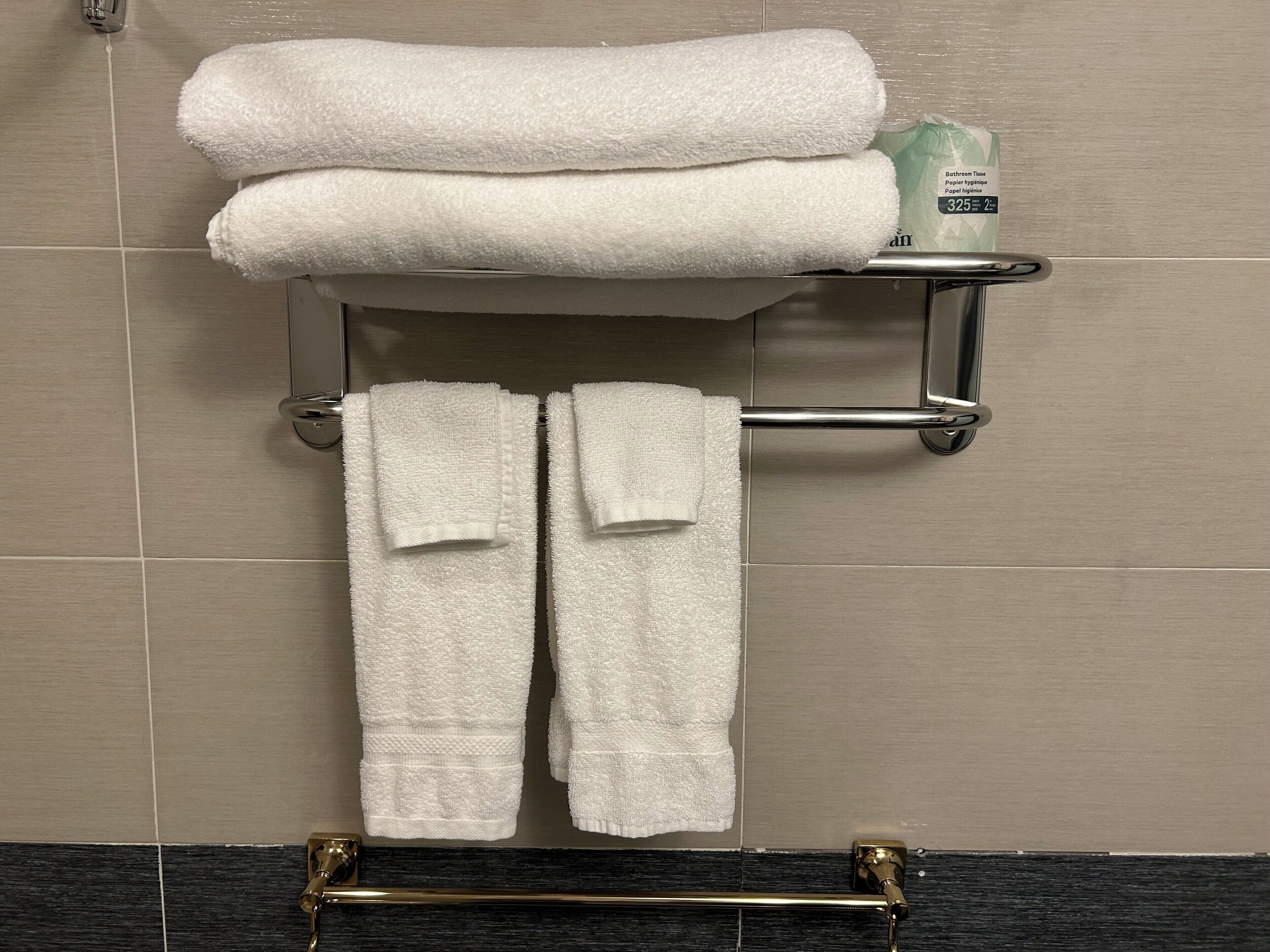 standard interior queen bed room | bathroom | combined shower/bathtub, rainfall showerhead, free toiletries