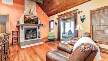Smart TV, fireplace, foosball, books