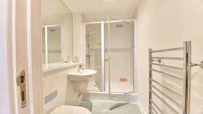 Bathtub, hair dryer, towels