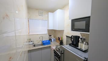 Fridge, microwave, oven, electric kettle