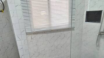 Shower, towels, toilet paper