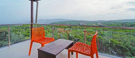 Desk, iron/ironing board, bed sheets