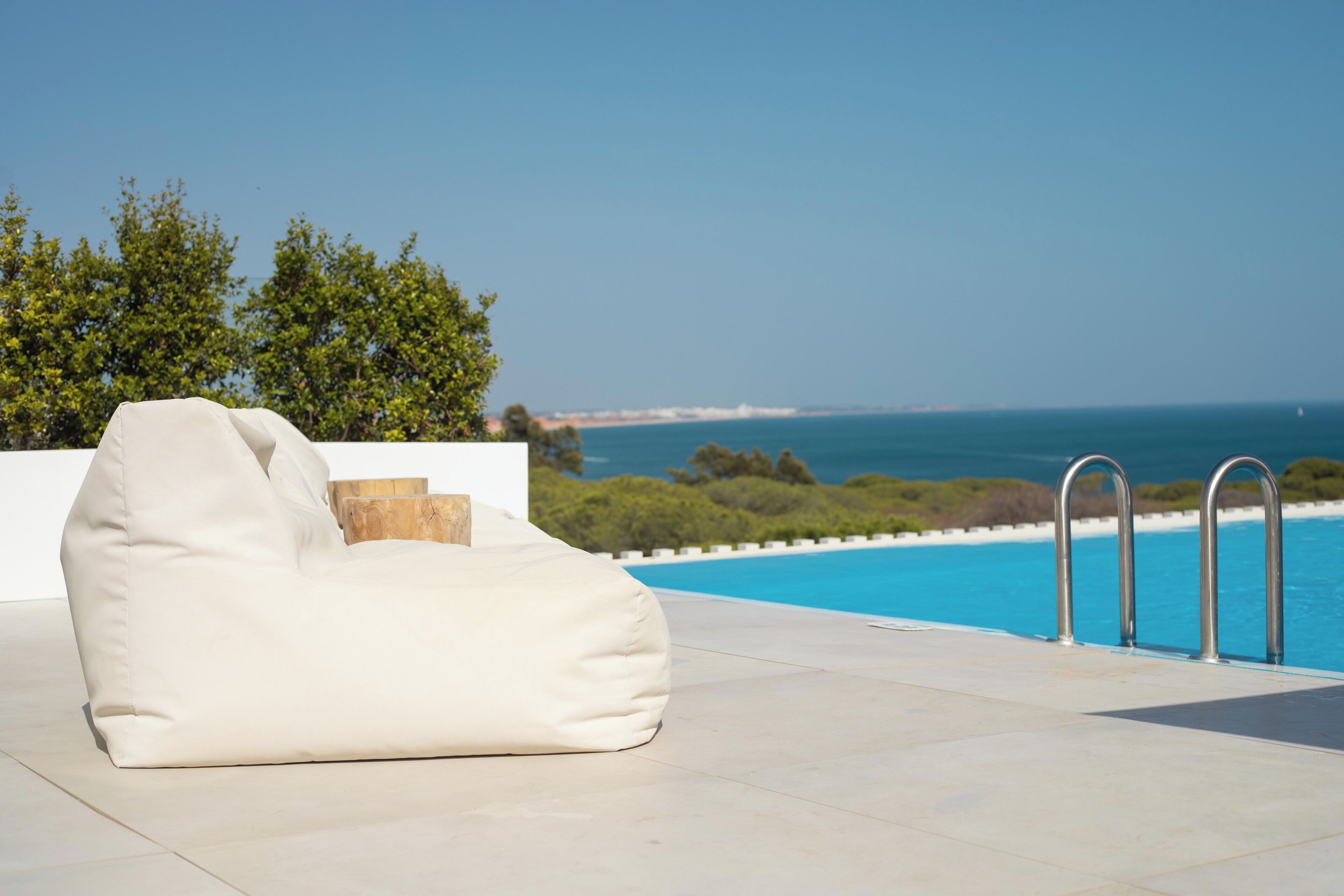 Outdoor pool, open 8:00 AM to 8:00 PM, sun loungers