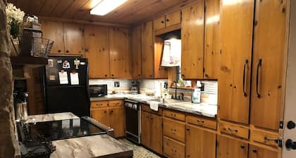 Lakefront rustic log cabin. Any season vacation, get away, or retreat.
