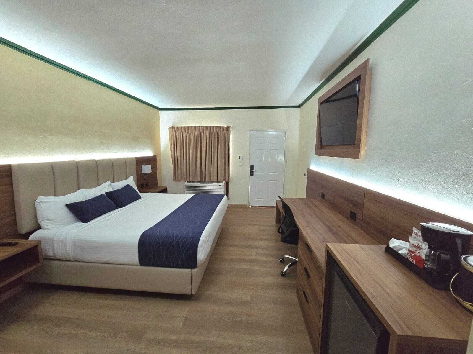 Deluxe-dobbeltværelse - 1 kingsize-seng | Pengeskab på værelset, skrivebord, mørklægningsgardiner, lydisolering