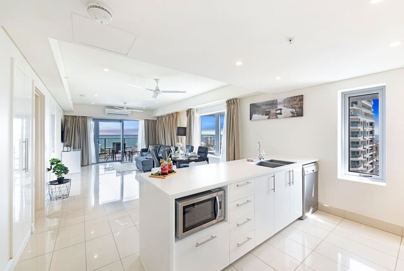 Fridge, coffee/tea maker, high chair, cookware/dishes/utensils