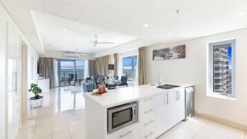 Fridge, coffee/tea maker, highchair, cookware/dishes/utensils