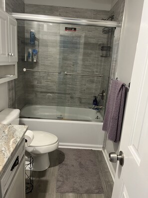 Combined shower/tub