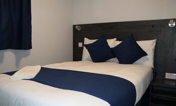 Desk, blackout curtains, soundproofing, iron/ironing board