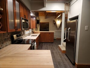 Fridge, microwave, oven, stovetop - Tahoe River Cabin on Private Beach (Markleeville)