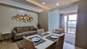 Deluxe Apartment | Living area | LED TV - The Venice Luxury Residences-Rare Units (Taguig)