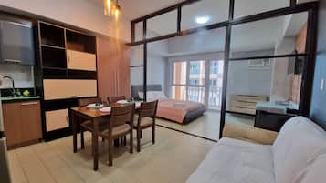 Elite Apartment | Individually decorated, individually furnished, desk, laptop workspace