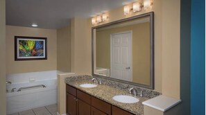 Combined shower/tub, jetted tub, hair dryer, towels