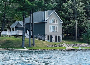 Exterior - Highlights:<br>Private beach just steps from your door<br>Includes kayaks for exploring the lake<br>Great fishing right off the shoreline or dock<br>Bring your boat and enjoy full boating access<br>Cozy indoor fireplace for cool evenings<br>4 spaciou (Pound)