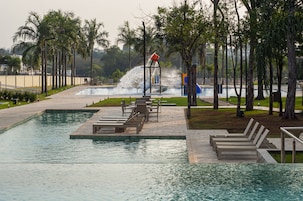 Indoor pool, 4 outdoor pools, open 10:00 AM to 10:00 PM, pool umbrellas
