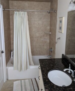 Combined shower/tub